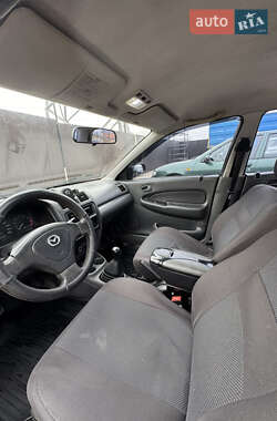 Седан Mazda 323 1997 в 