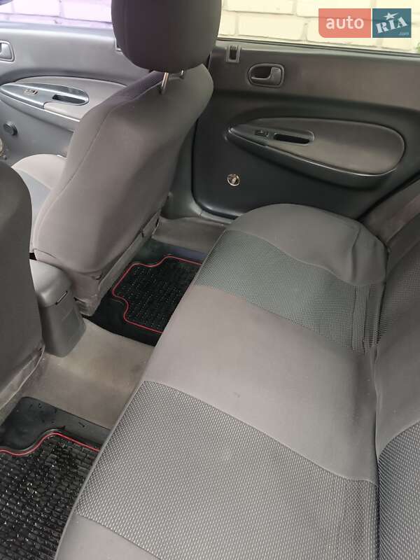 Седан Mazda 323 1997 в Шептицькому фото 7 Седан Mazda 323 1997 в Шептицькому