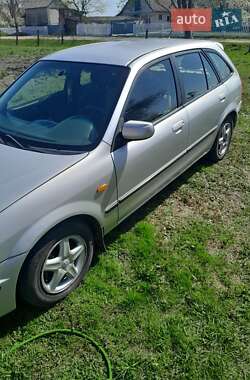 Седан Mazda 323 1999 в 