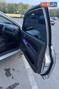 Хэтчбек Mazda 323 1998 в 