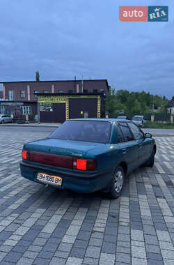 Седан Mazda 323 1995 в 