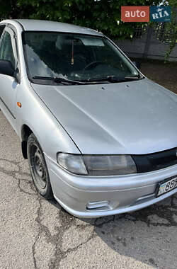 Седан Mazda 323 1998 в 