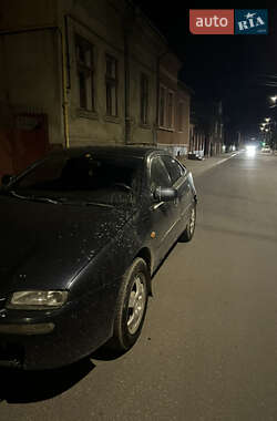 Хэтчбек Mazda 323 1998 в 