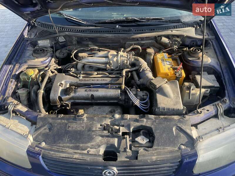 Седан Mazda 323 1995 в Киеве