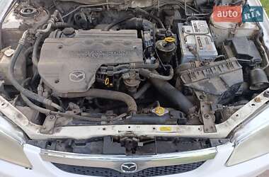 Седан Mazda 323 1999 в 