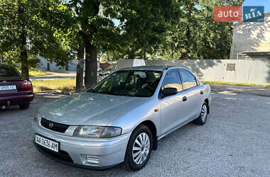Седан Mazda 323 1998 в 
