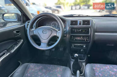 Седан Mazda 323 1998 в 