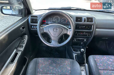 Седан Mazda 323 1998 в 
