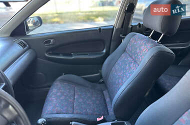 Седан Mazda 323 1998 в 