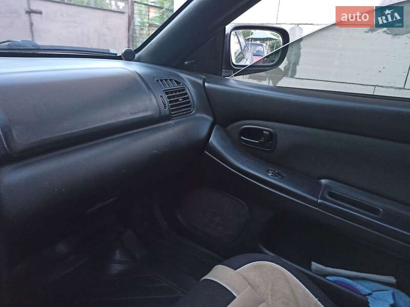 Седан Mazda 323 1998 в Белой Церкви фото 6 Седан Mazda 323 1998 в Белой Церкви