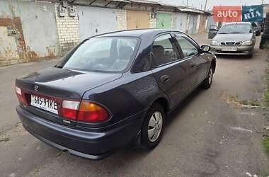 Седан Mazda 323 1998 в 