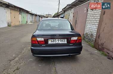 Седан Mazda 323 1998 в 