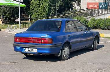 Седан Mazda 323 1991 в 