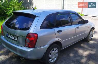 Хэтчбек Mazda 323 2003 в 