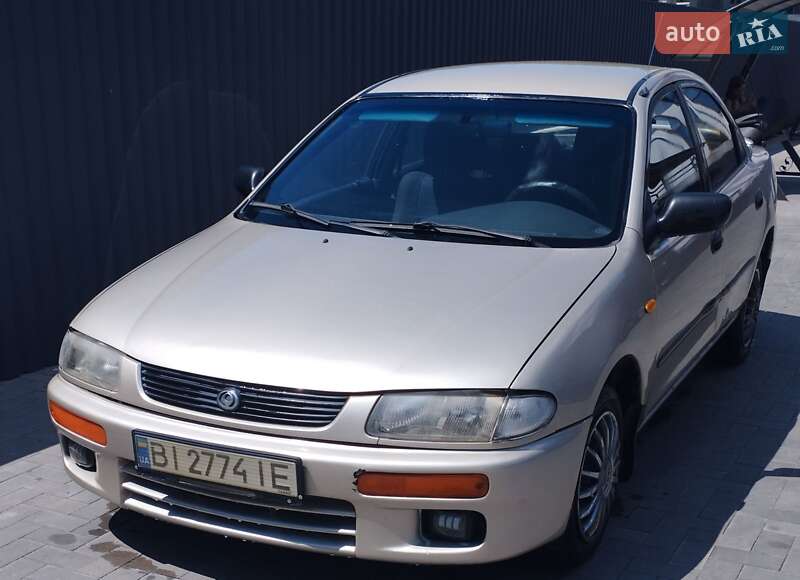 Седан Mazda 323 1995 в Кременчуці фото 3 Седан Mazda 323 1995 в Кременчуці