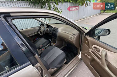 Седан Mazda 323 1999 в 