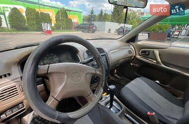 Седан Mazda 323 1999 в 