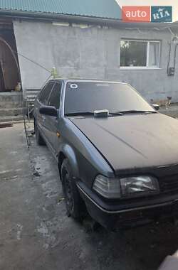 Хэтчбек Mazda 323 1987 в 