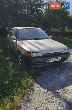Седан Mazda 323 1996 в Кореці
