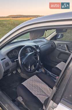 Хэтчбек Mazda 323 1998 в 
