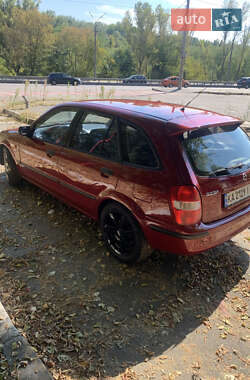 Хетчбек Mazda 323 1999 в 