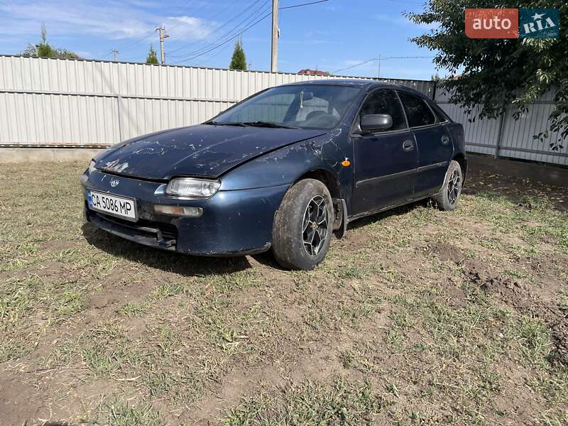 Хетчбек Mazda 323 1997 в Корсунь-Шевченківському фото 3 Хетчбек Mazda 323 1997 в Корсунь-Шевченківському
