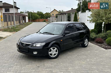 Хэтчбек Mazda 323 2003 в 