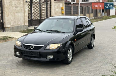 Хэтчбек Mazda 323 2003 в 