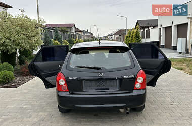 Хэтчбек Mazda 323 2003 в 
