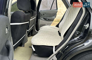 Хэтчбек Mazda 323 2003 в 
