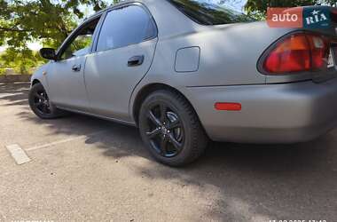 Седан Mazda 323 1996 в 