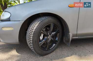 Седан Mazda 323 1996 в 