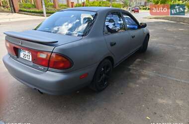 Седан Mazda 323 1996 в 