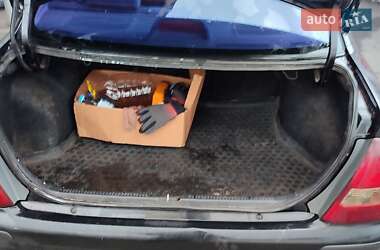 Седан Mazda 323 1999 в 