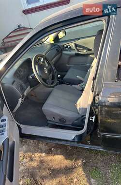 Хэтчбек Mazda 323 2002 в 