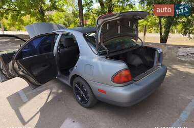 Седан Mazda 323 1996 в 