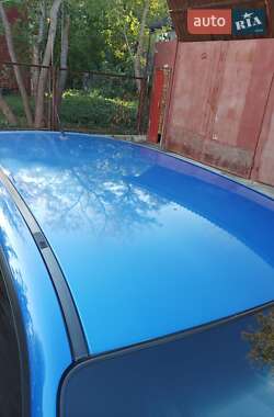 Хэтчбек Mazda 323 2003 в 