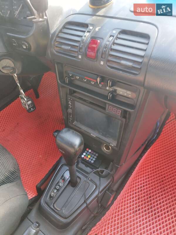 Хэтчбек Mazda 323 1994 в Нововолынске фото 12 Хэтчбек Mazda 323 1994 в Нововолынске