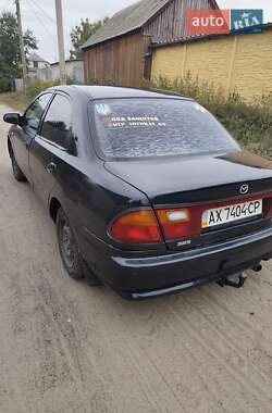 Седан Mazda 323 1998 в Зміїві