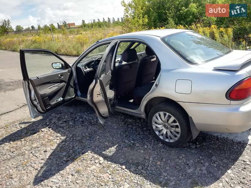 Седан Mazda 323 1996 в Ровно фото 3 Седан Mazda 323 1996 в Ровно