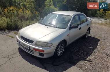 Седан Mazda 323 1996 в  фото 14 Седан Mazda 323 1996 в
