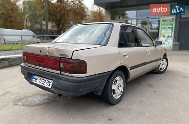Седан Mazda 323 1996 в 