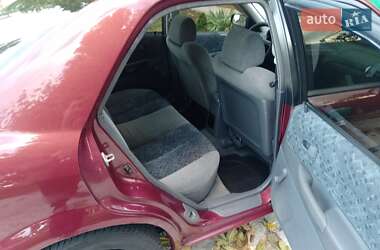 Седан Mazda 323 1999 в 