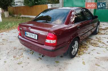 Седан Mazda 323 1999 в 