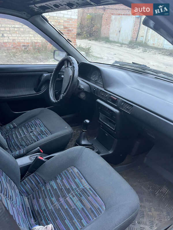 Седан Mazda 323 1994 в Ирпене фото 10 Седан Mazda 323 1994 в Ирпене