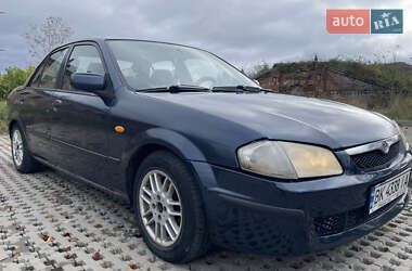 Седан Mazda 323 1999 в 