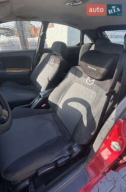 Хэтчбек Mazda 323 1995 в  фото 11 Хэтчбек Mazda 323 1995 в