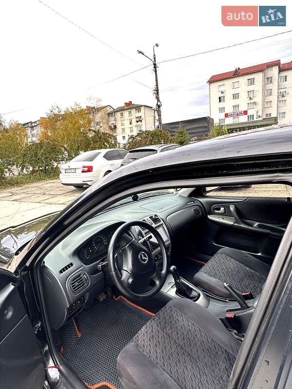 Хетчбек Mazda 323 2001 в Самборі фото 6 Хетчбек Mazda 323 2001 в Самборі
