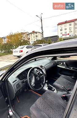 Хэтчбек Mazda 323 2001 в  фото 6 Хэтчбек Mazda 323 2001 в
