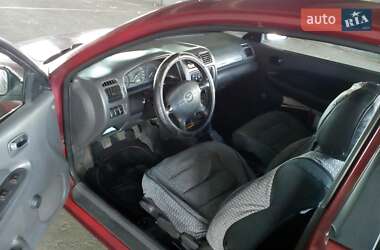 Хетчбек Mazda 323 2001 в  фото 2 Хетчбек Mazda 323 2001 в
